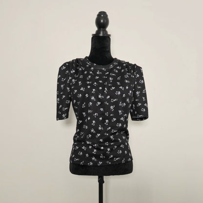 T-shirt noir à motif fleuri