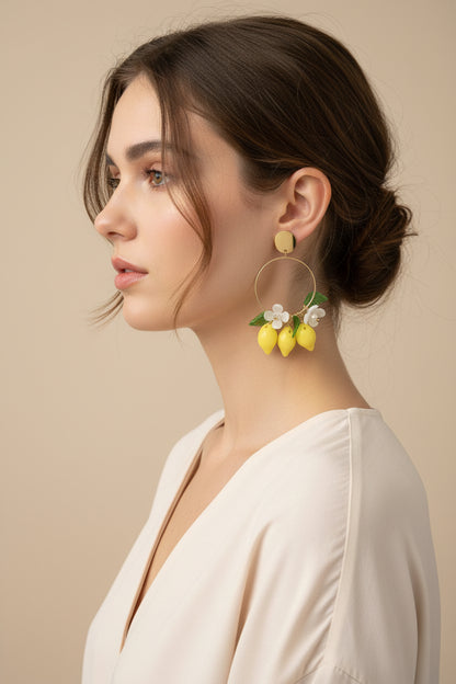 Boucles d'oreilles pendantes dorées citrons et feuilles
