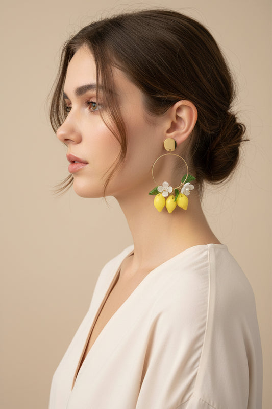 Boucles d'oreilles pendantes dorées citrons et feuilles