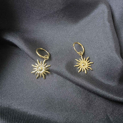 Boucles d’oreilles créoles pendentif soleil
