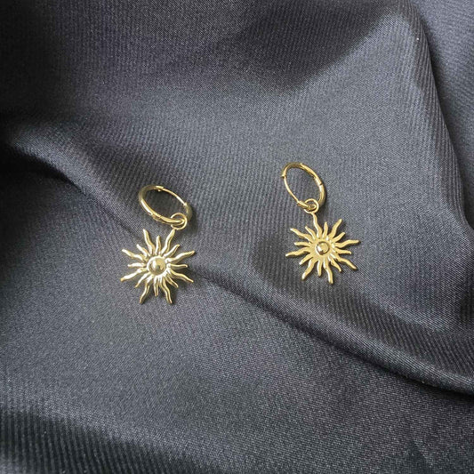 Boucles d’oreilles créoles pendentif soleil