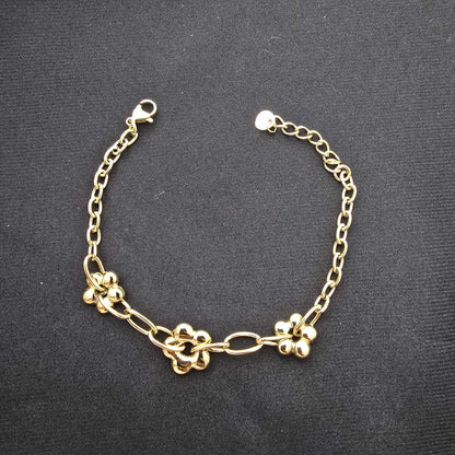 Bracelet Chaine Dorée Avec Triple Fleur Dans Maillons