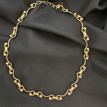 Collier Chaine Dorée Maille Sinueuse et Boule Sphère Effet Brillant
